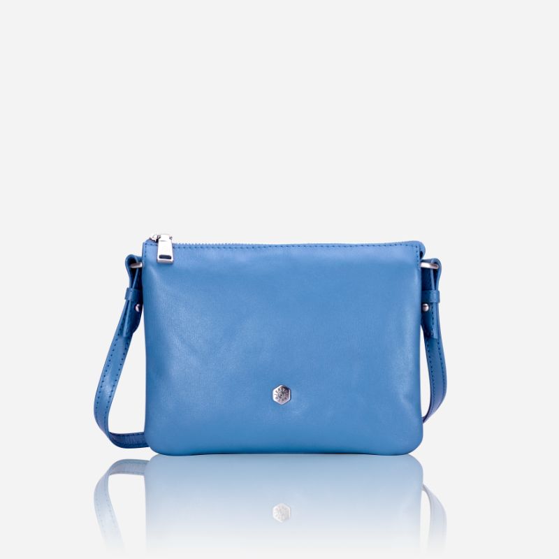 Slim Ladies Leather Crossbody handbag in sea glass color, featuring a sleek design and adjustable strap.