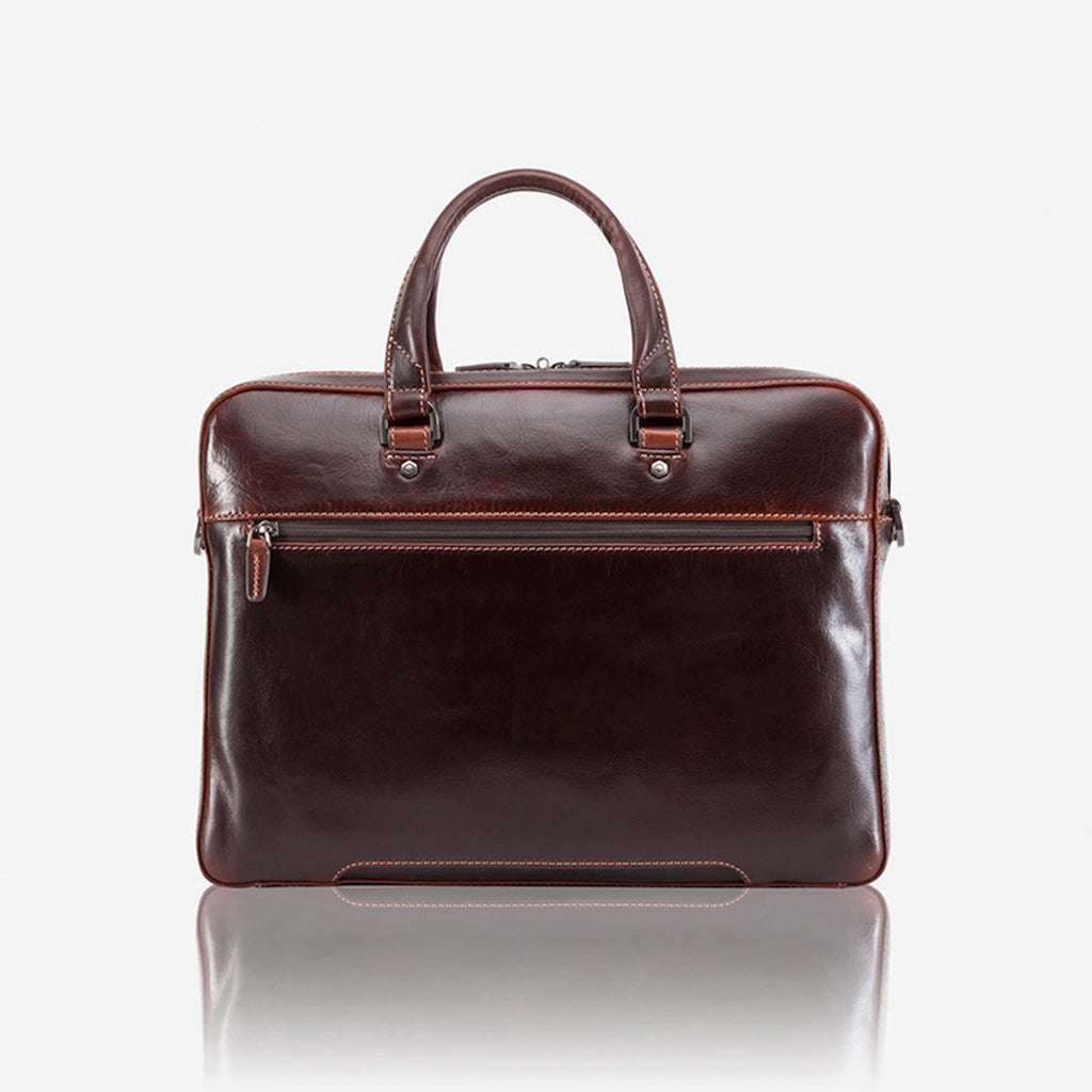 Slim Zip Top Briefcase in Tobacco leather, showcasing its elegant design and spacious zippered compartment.