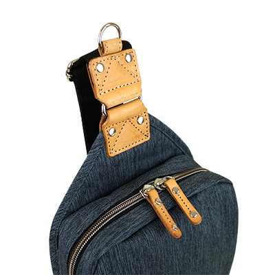 SLING PACK ELEMENT in three colors, showcasing its sleek design and multiple pockets.