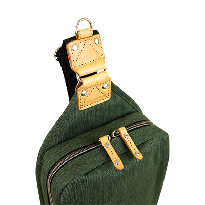 SLING PACK ELEMENT in three colors, showcasing its sleek design and multiple pockets.