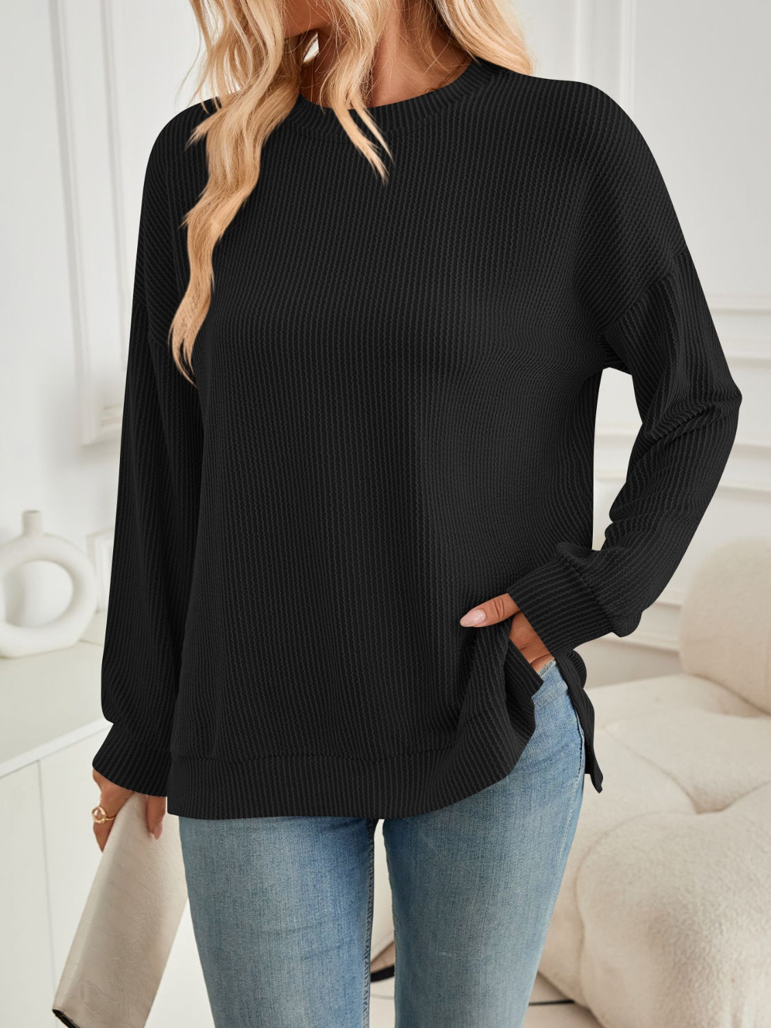 A stylish Slit Round Neck Long Sleeve Sweatshirt featuring a modern slit design, made from a soft and stretchy fabric blend.