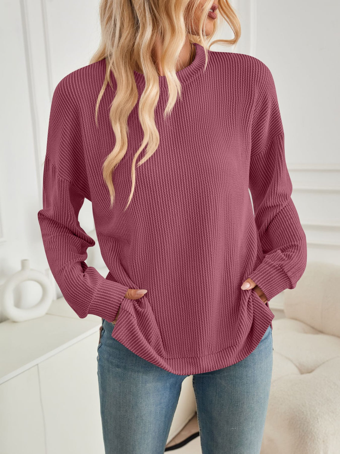 A stylish Slit Round Neck Long Sleeve Sweatshirt featuring a modern slit design, made from a soft and stretchy fabric blend.