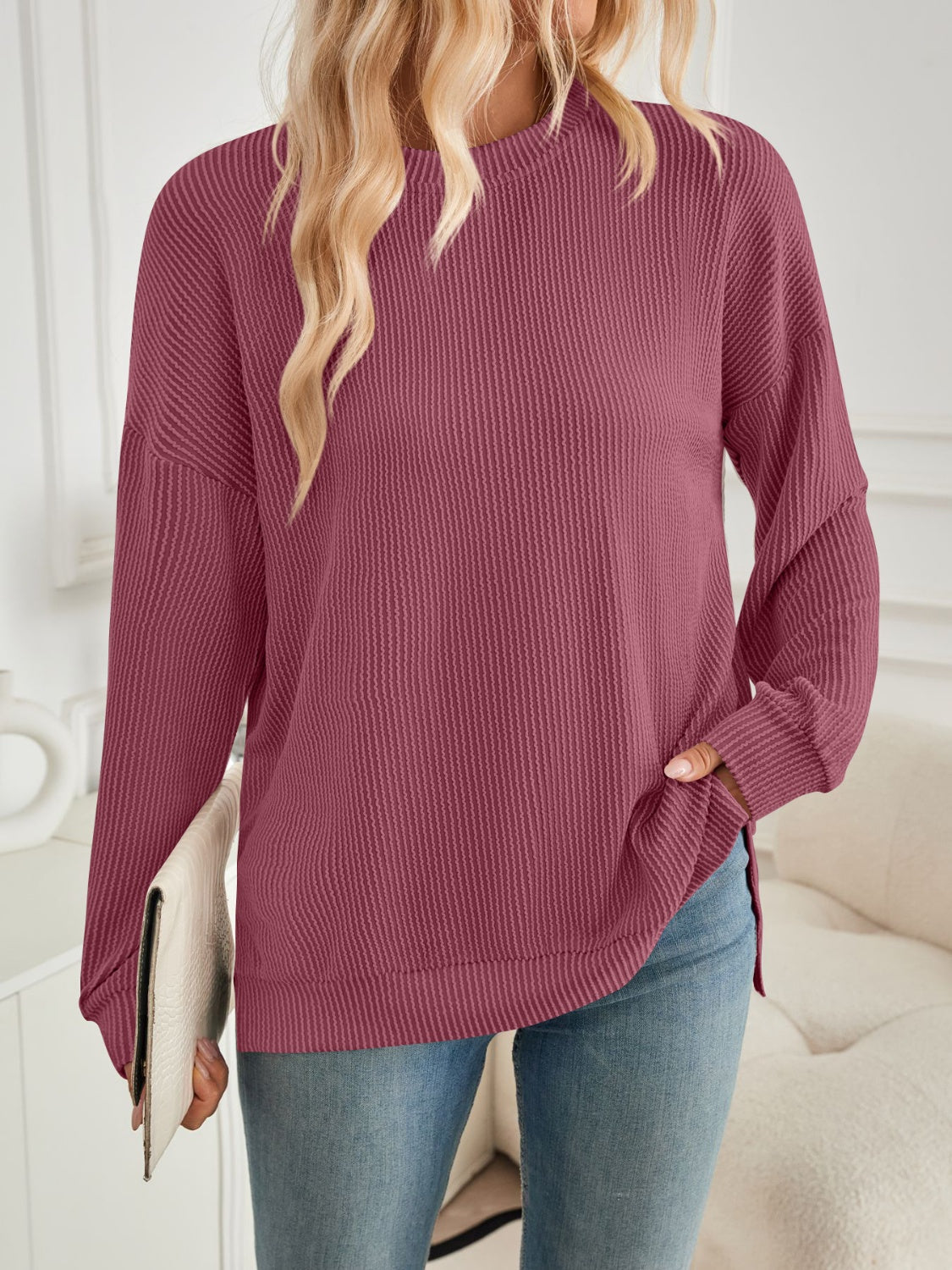 A stylish Slit Round Neck Long Sleeve Sweatshirt featuring a modern slit design, made from a soft and stretchy fabric blend.