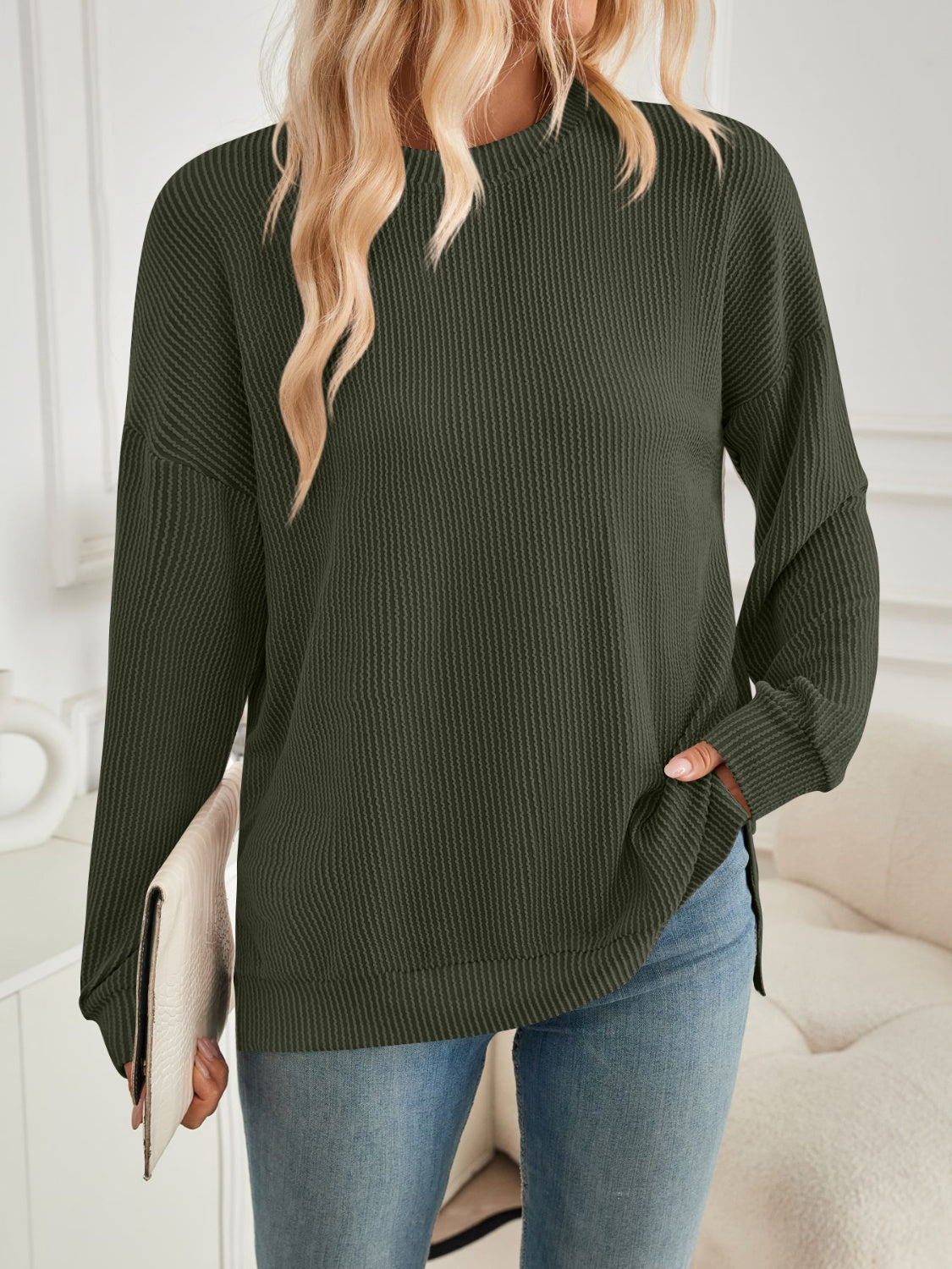 A stylish Slit Round Neck Long Sleeve Sweatshirt featuring a modern slit design, made from a soft and stretchy fabric blend.