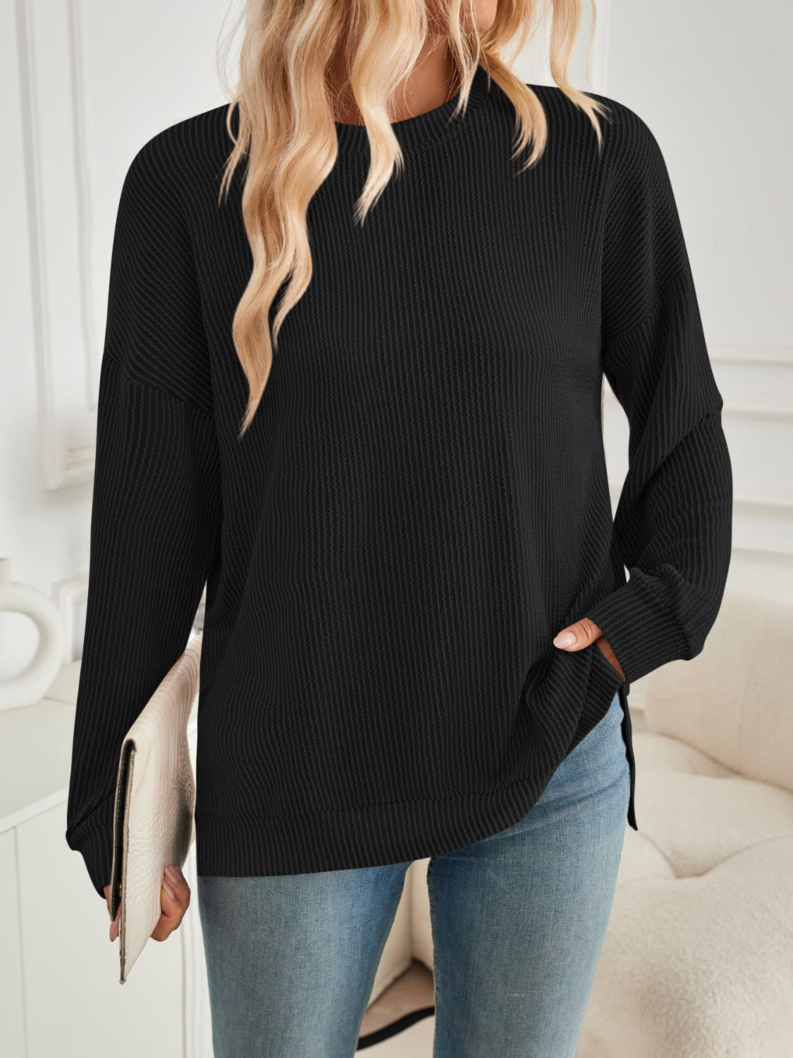 A stylish Slit Round Neck Long Sleeve Sweatshirt featuring a modern slit design, made from a soft and stretchy fabric blend.
