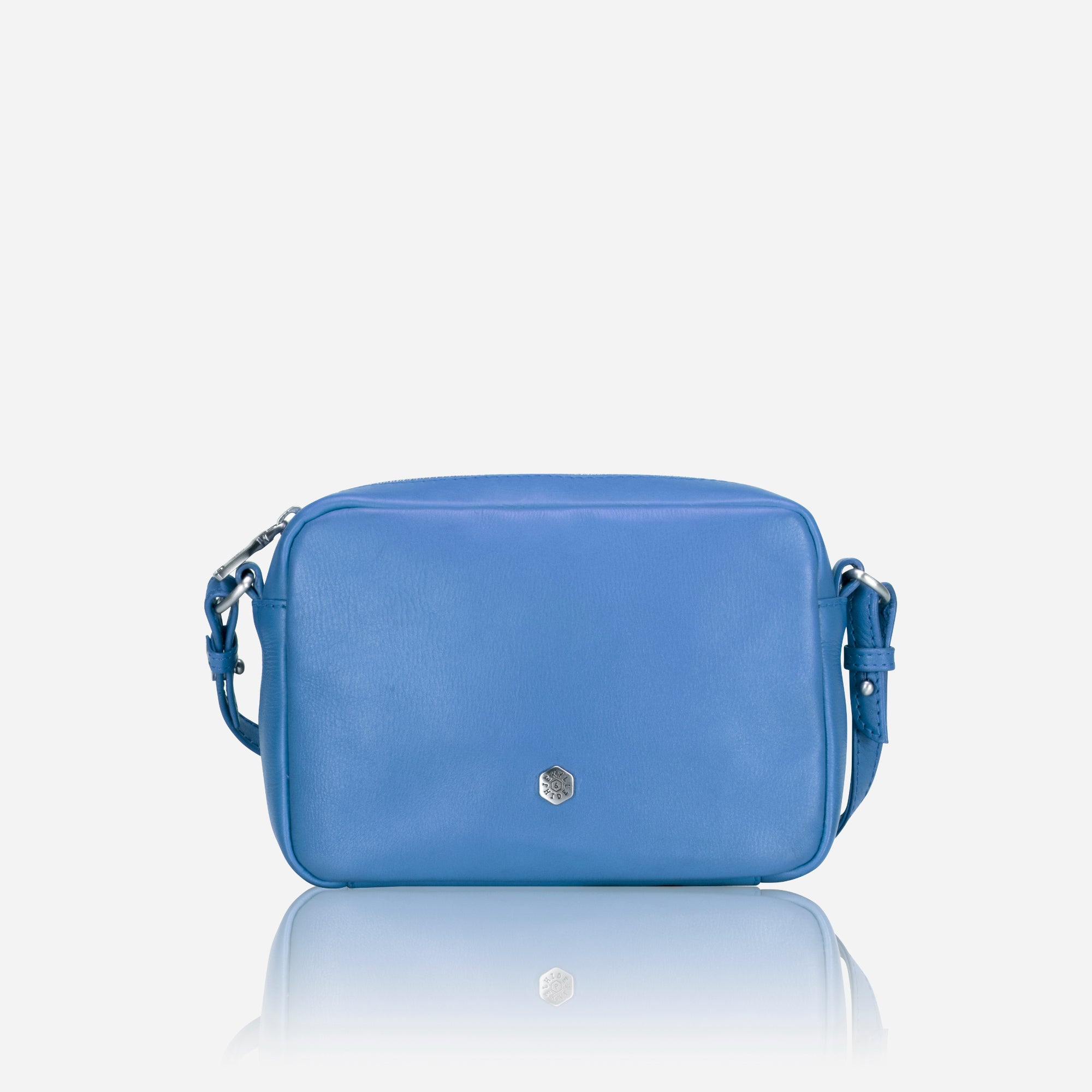 Small Crossbody bag in Sea Glass color with vibrant lining, showcasing its sleek design and spacious interior.