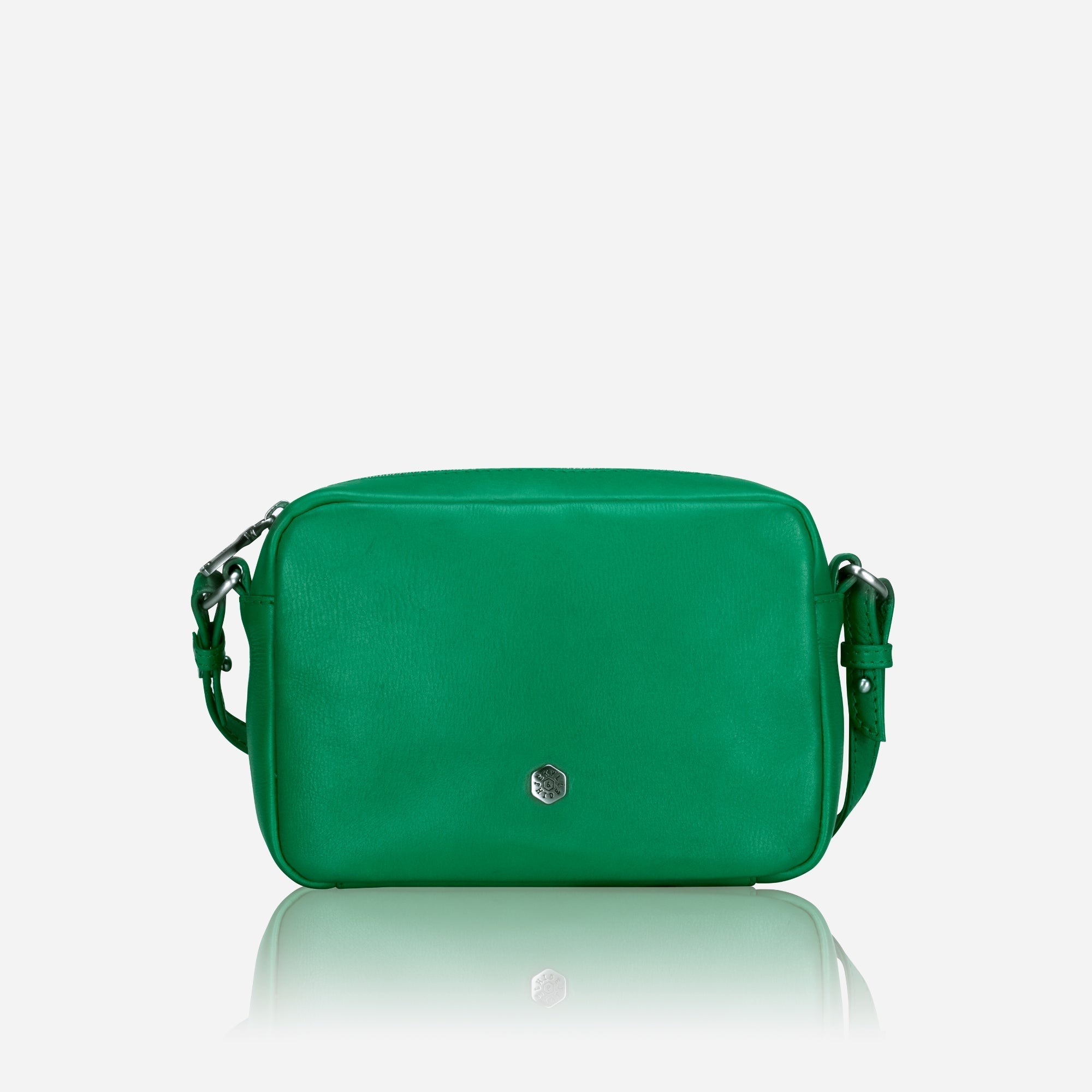Small Crossbody bag in Spring Basil color with vibrant lining, showcasing its sleek design and spacious interior.