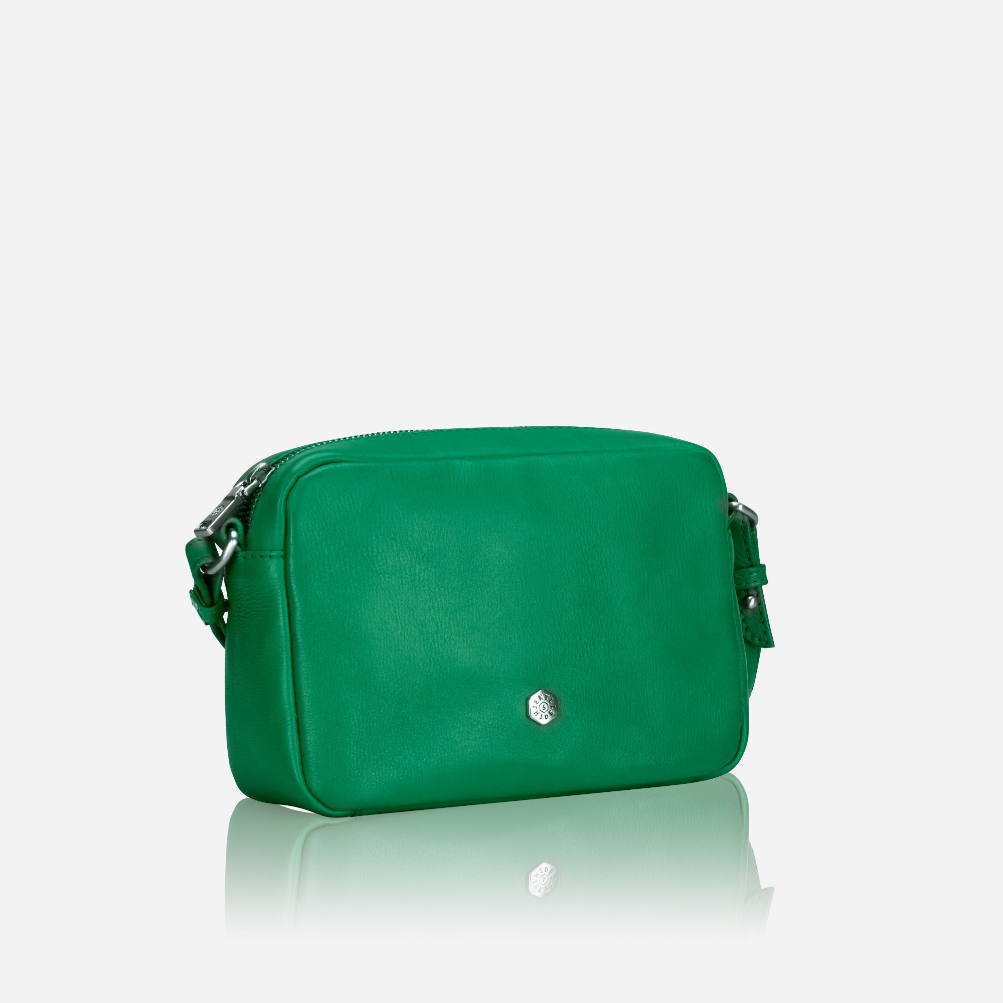 Small Crossbody bag in Spring Basil color with vibrant lining, showcasing its sleek design and spacious interior.