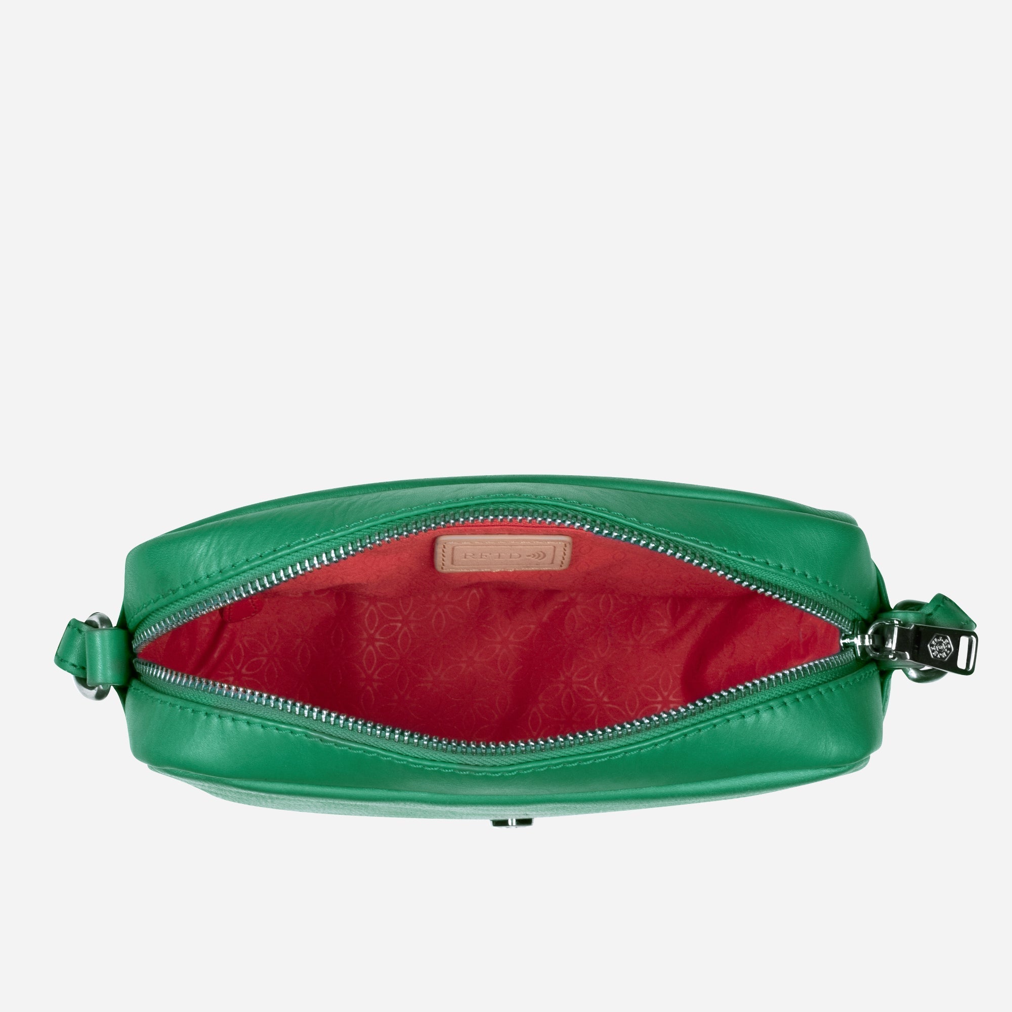 Small Crossbody bag in Spring Basil color with vibrant lining, showcasing its sleek design and spacious interior.
