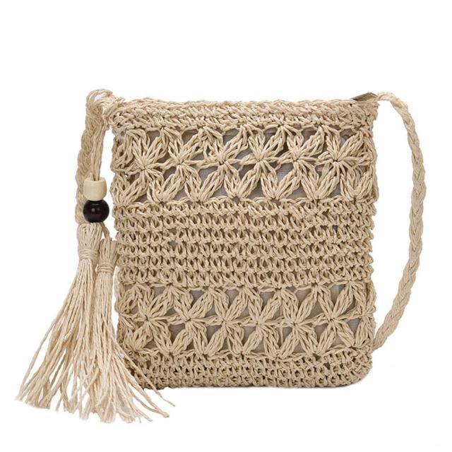 Small Straw Summer Crossbody handbag featuring a tassel and patchwork design, perfect for summer outings.