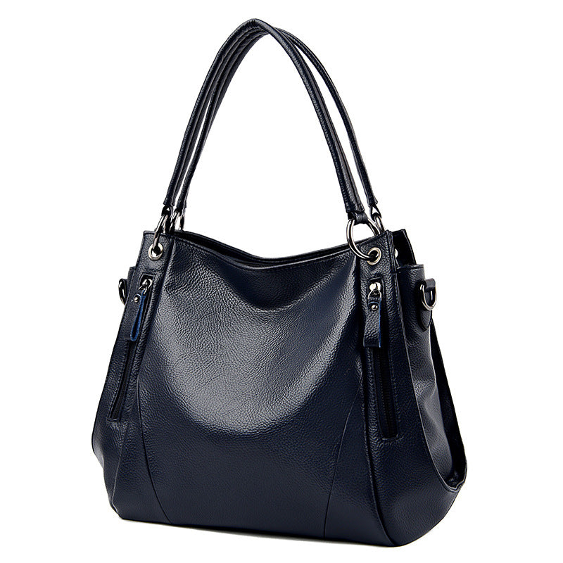 Soft Leather Boston Style Handbag for Women featuring a chic design, spacious interior, and durable PU leather material.