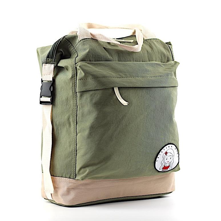 Soft polyester bag and backpack in four colors, featuring adjustable straps and multiple zipped pockets for convenience.