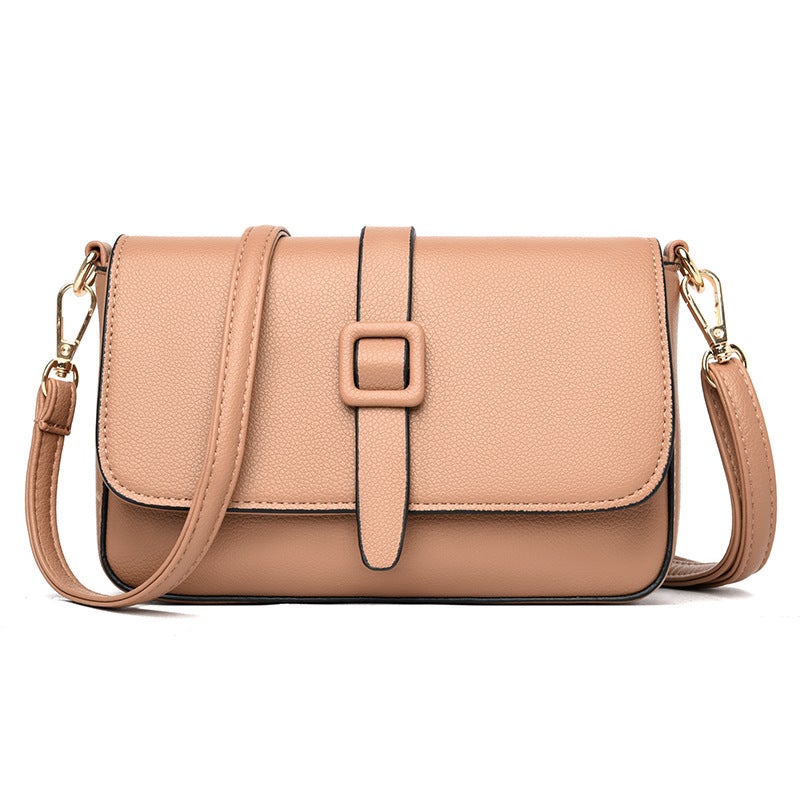 Solid Color Female Underarm Small Square Bag made of leather, featuring a lock closure and multiple internal pockets, perfect for everyday use.