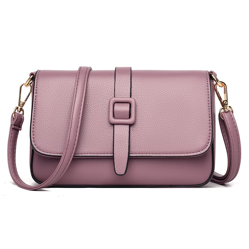 Solid Color Female Underarm Small Square Bag made of leather, featuring a lock closure and multiple internal pockets, perfect for everyday use.