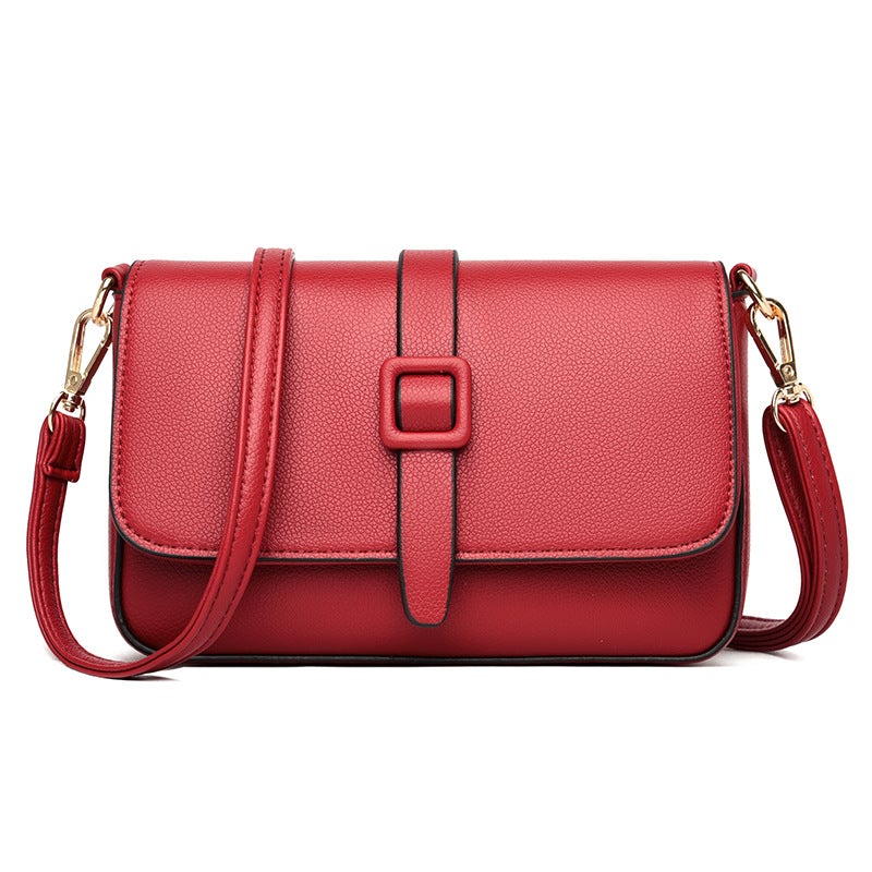 Solid Color Female Underarm Small Square Bag made of leather, featuring a lock closure and multiple internal pockets, perfect for everyday use.