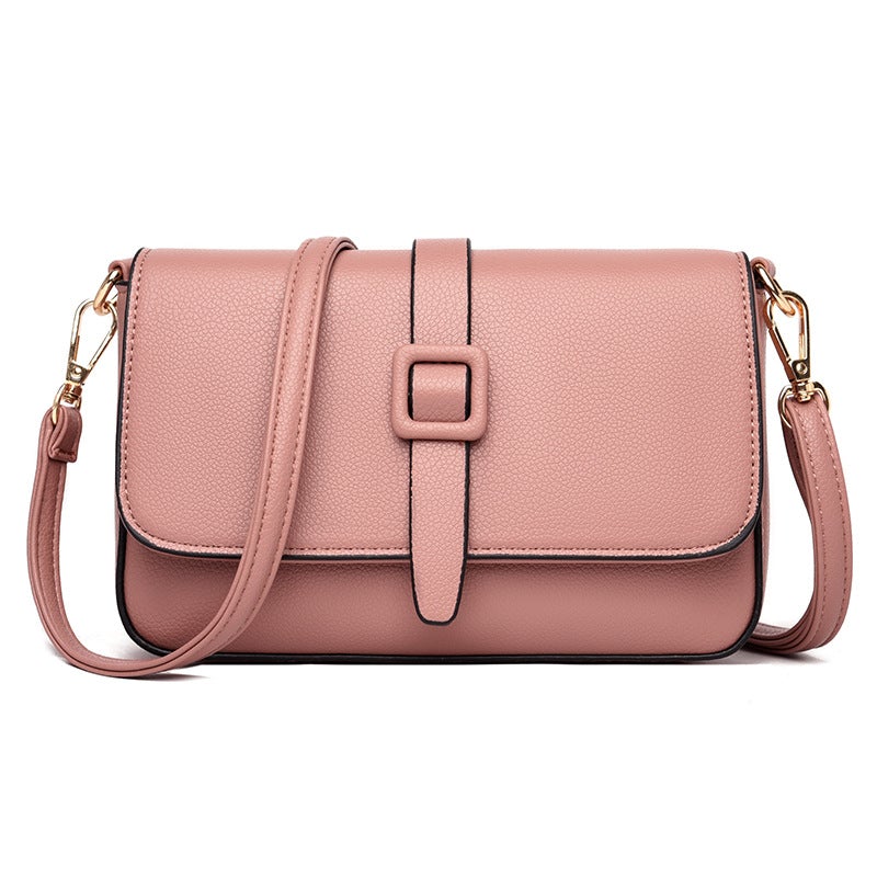 Solid Color Female Underarm Small Square Bag made of leather, featuring a lock closure and multiple internal pockets, perfect for everyday use.