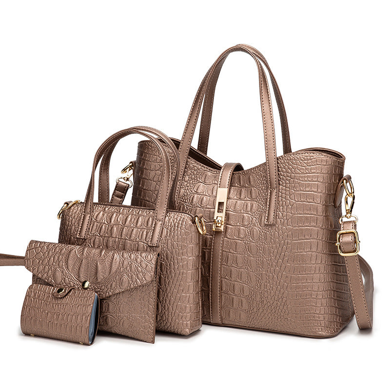 A stylish four-piece handbag set for women in solid colors, featuring a modern design with embossed detailing and adjustable straps.