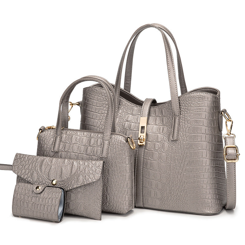 A stylish four-piece handbag set for women in solid colors, featuring a modern design with embossed detailing and adjustable straps.