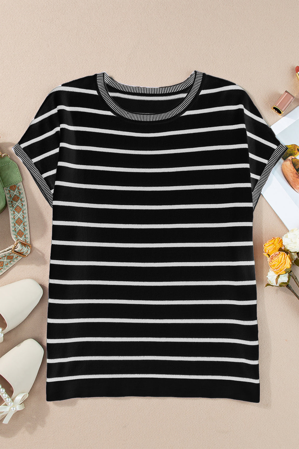 Striped round neck cap sleeve knit top in a stylish design, showcasing its soft fabric and comfortable fit.