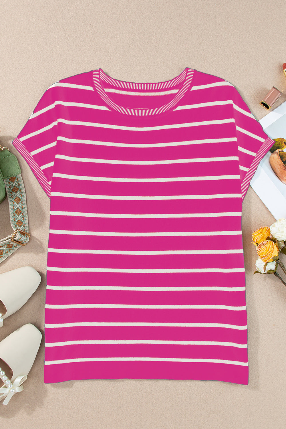 Striped round neck cap sleeve knit top in a stylish design, showcasing its soft fabric and comfortable fit.