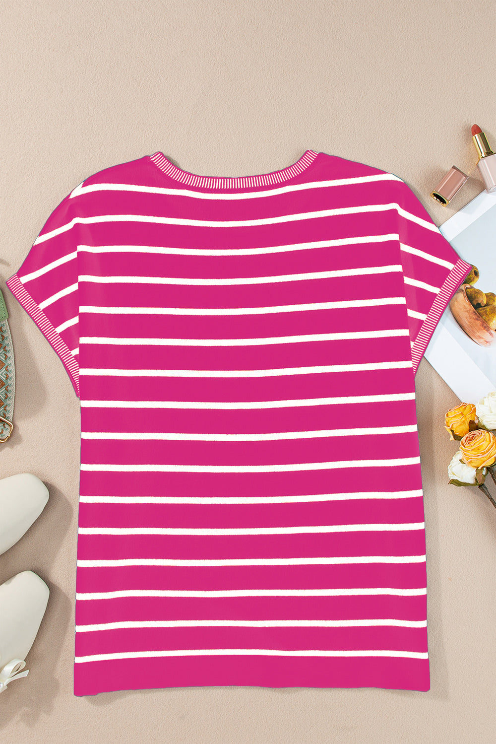 Striped round neck cap sleeve knit top in a stylish design, showcasing its soft fabric and comfortable fit.