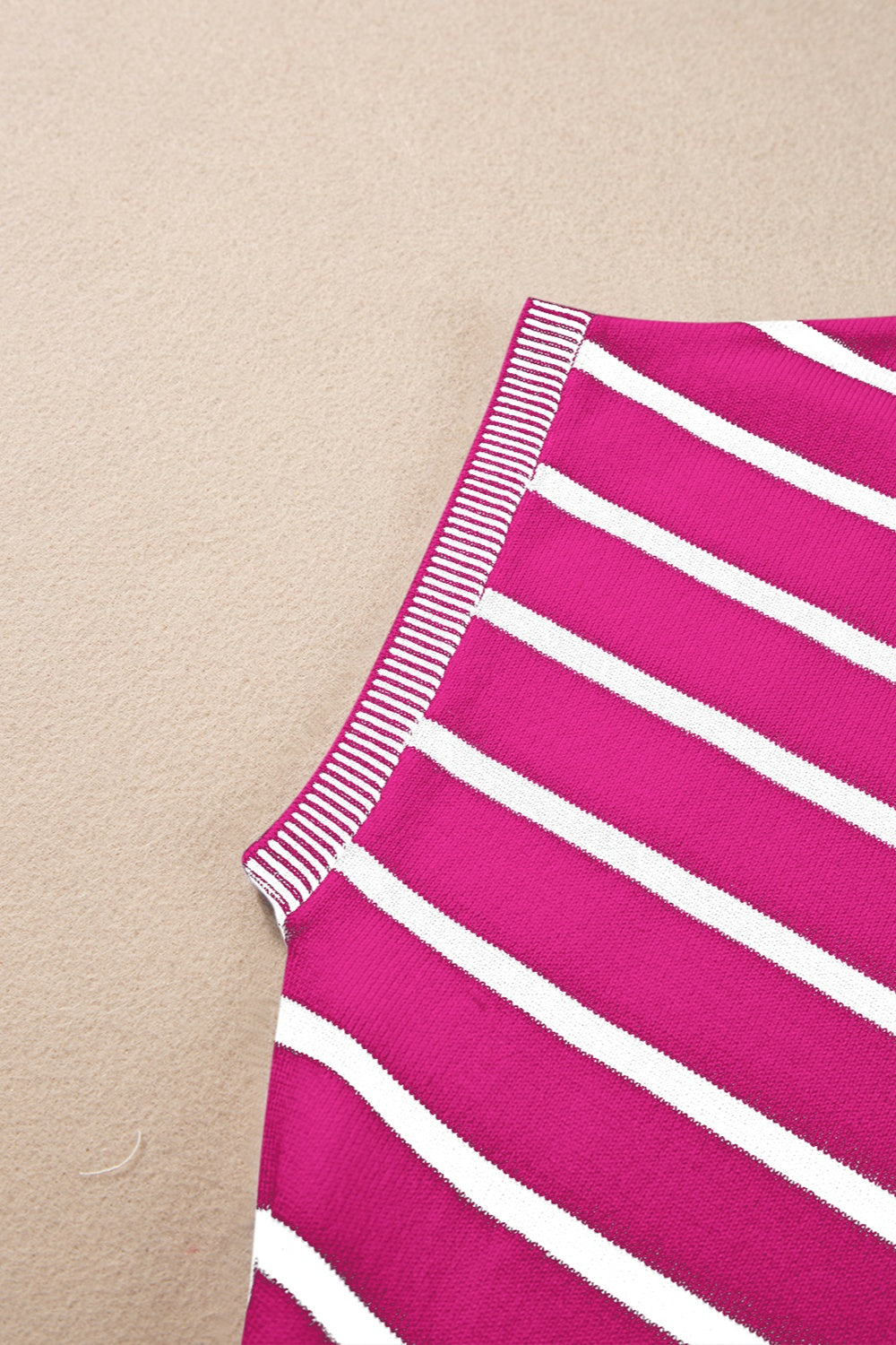 Striped round neck cap sleeve knit top in a stylish design, showcasing its soft fabric and comfortable fit.