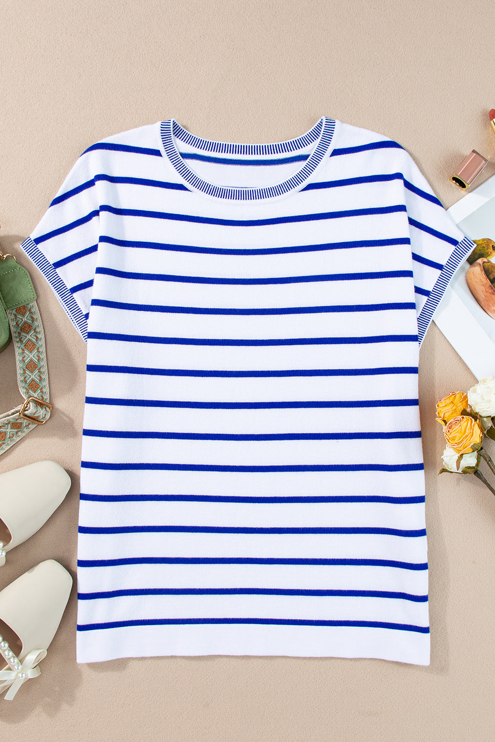 Striped round neck cap sleeve knit top in a stylish design, showcasing its soft fabric and comfortable fit.