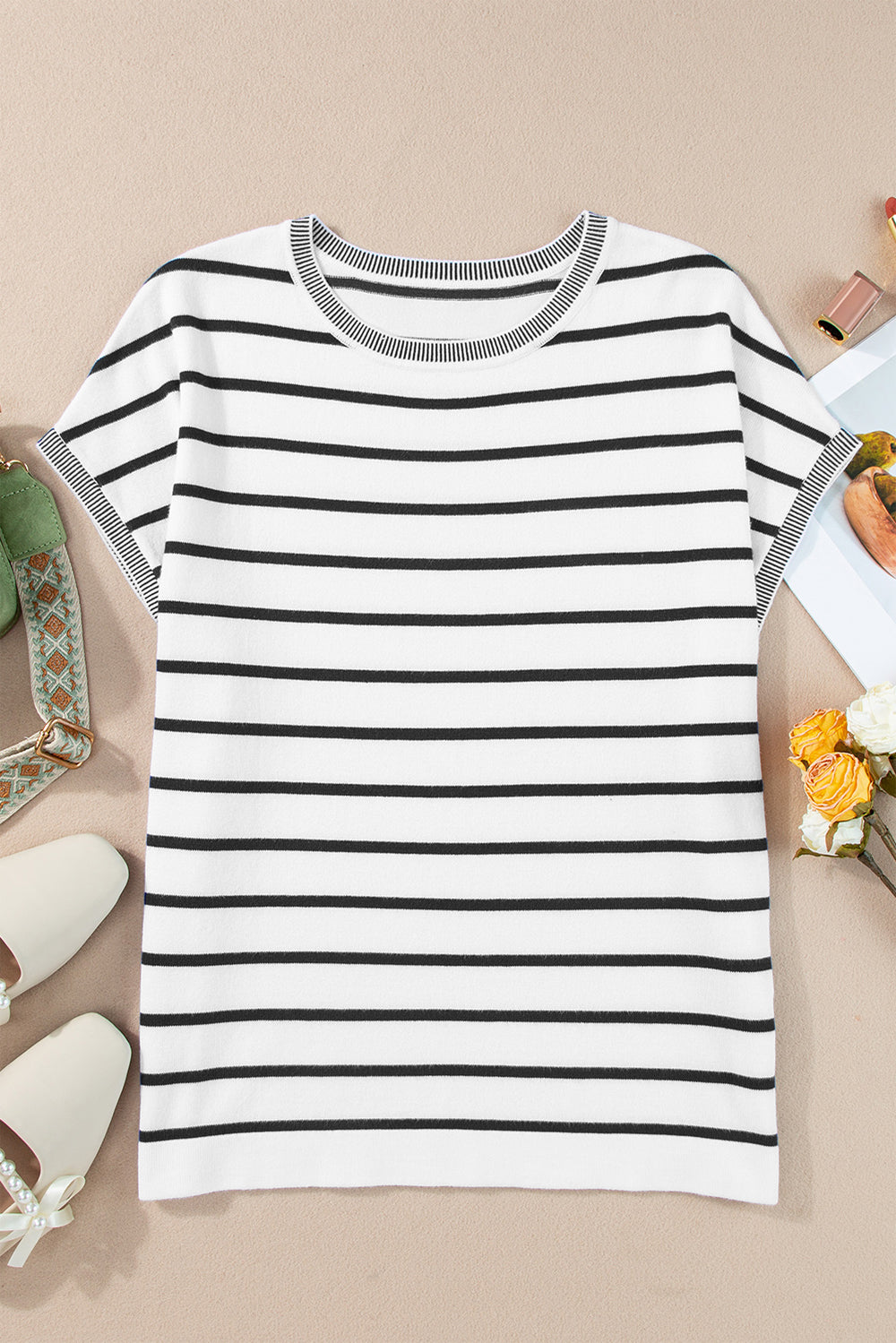 Striped round neck cap sleeve knit top in a stylish design, showcasing its soft fabric and comfortable fit.