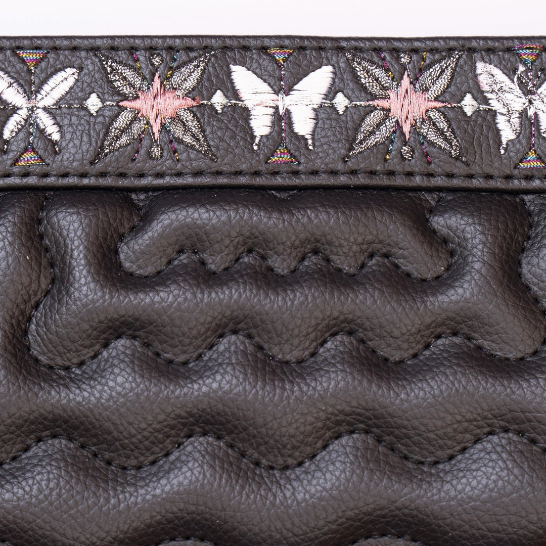 Sunday 01 Shoulder Bag in vegan leather with quilted patterns and stylish straps.