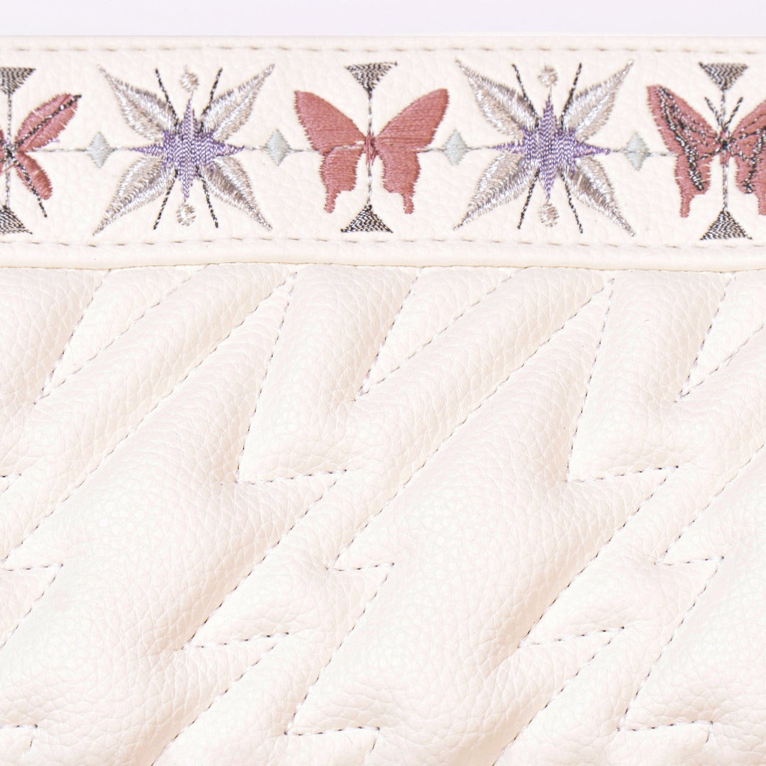 Sunday 01 Shoulder Bag in vegan leather with quilted patterns and stylish straps.