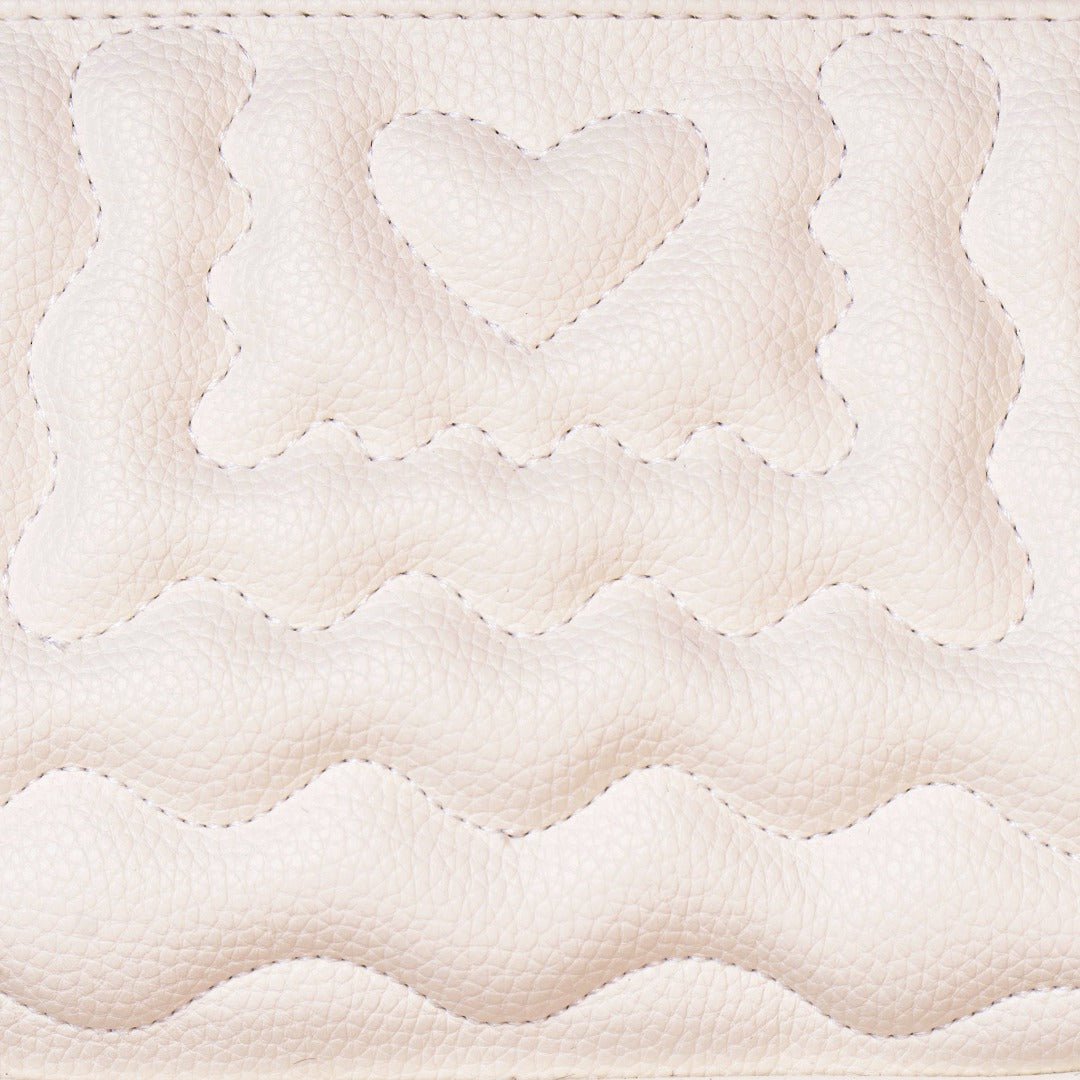 Sunday 01 Shoulder Bag in vegan leather with quilted patterns and stylish straps.