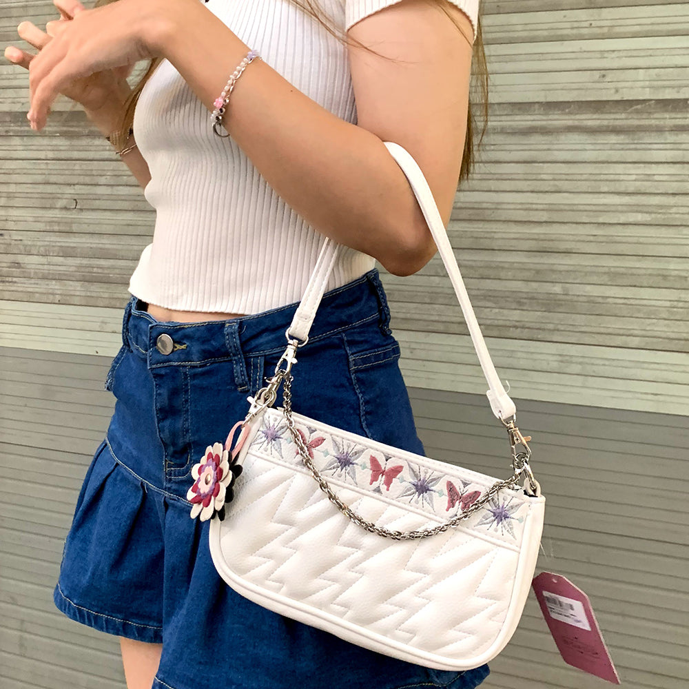 Sunday 01 Shoulder Bag in vegan leather with quilted patterns and stylish straps.