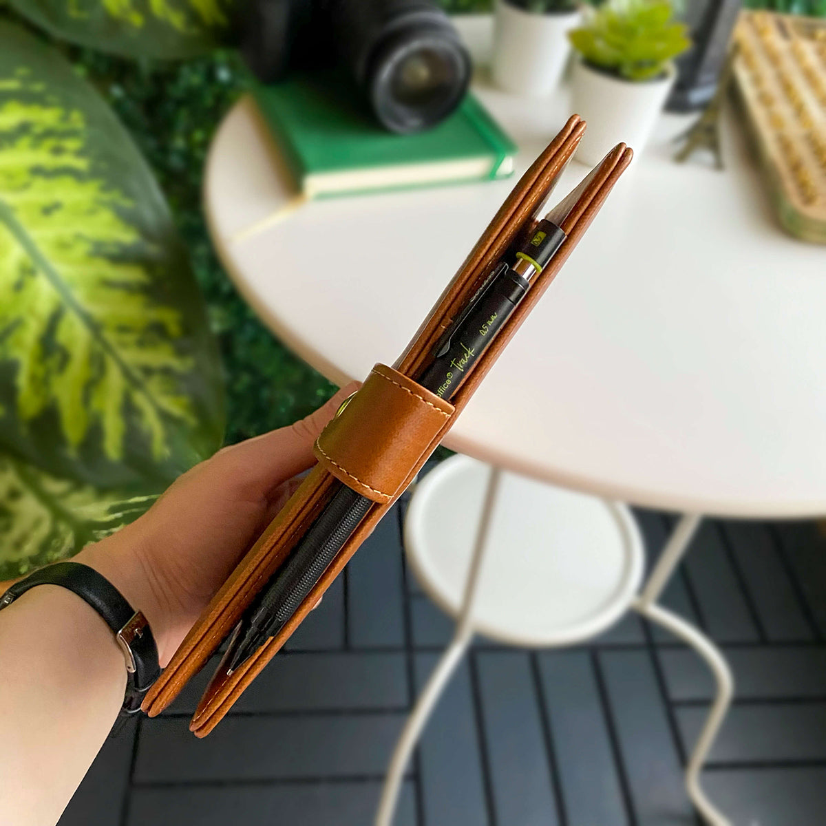 Tesino Vegan Leather Motherpass, a stylish motherhood organizer with multiple compartments, designed for new moms.