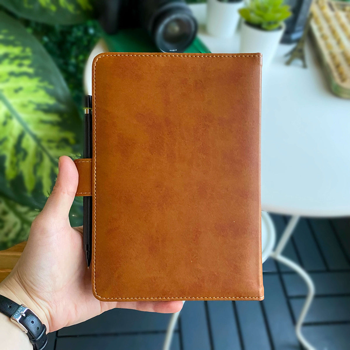 Tesino Vegan Leather Motherpass, a stylish motherhood organizer with multiple compartments, designed for new moms.