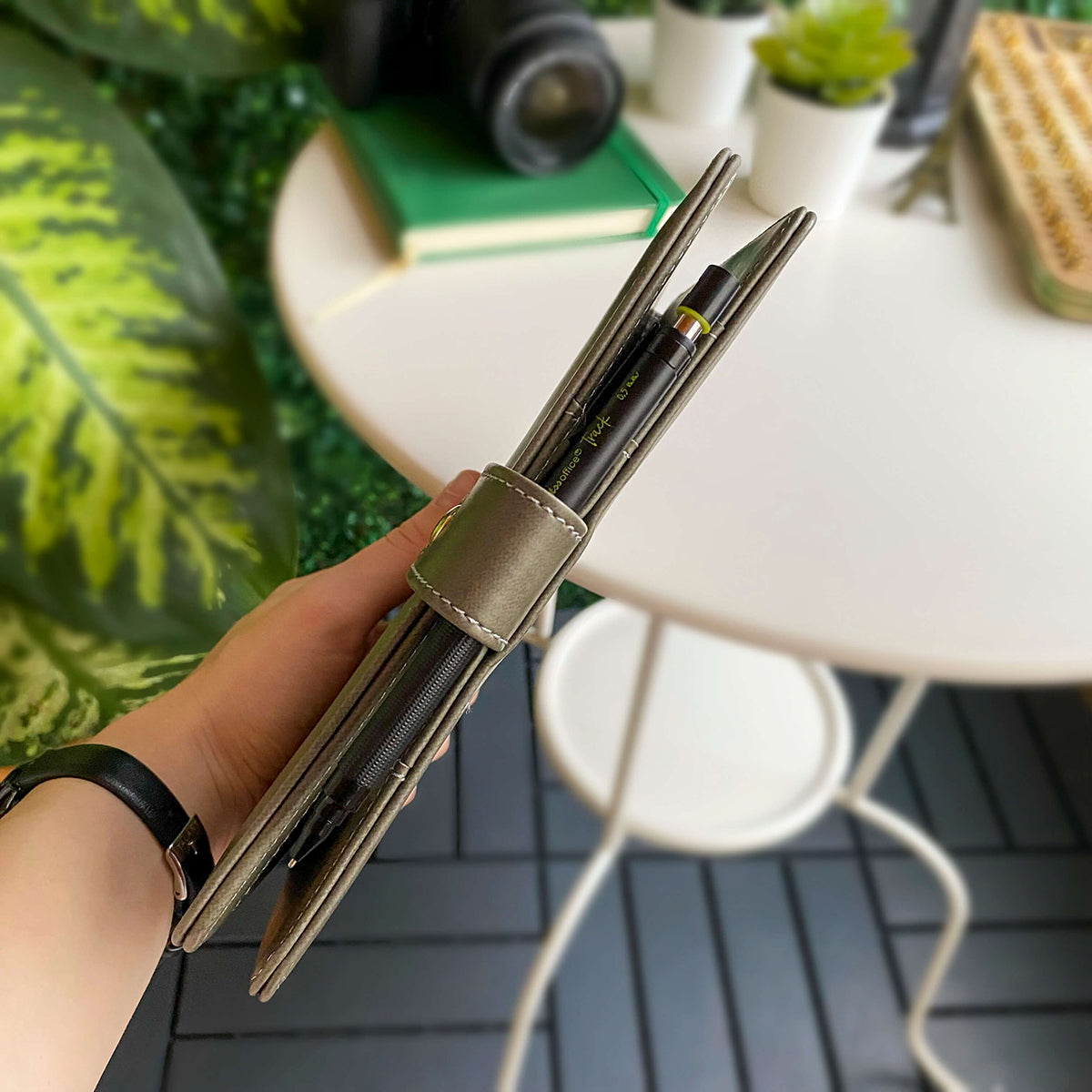 Tesino Vegan Leather Motherpass, a stylish motherhood organizer with multiple compartments, designed for new moms.