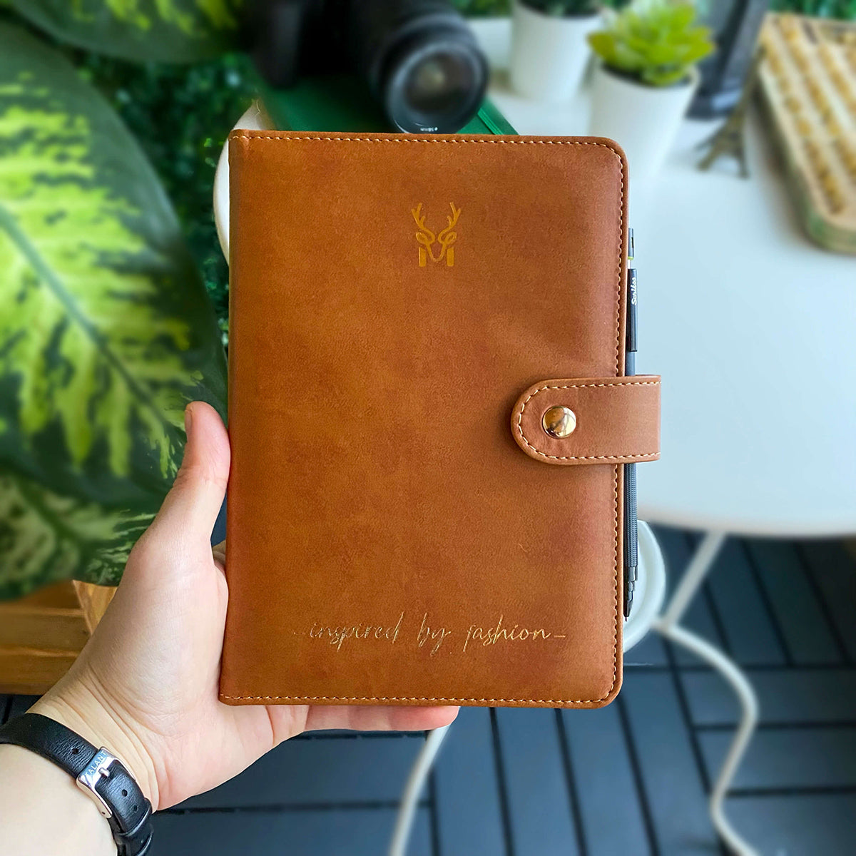 Tesino Vegan Leather Motherpass, a stylish motherhood organizer with multiple compartments, designed for new moms.