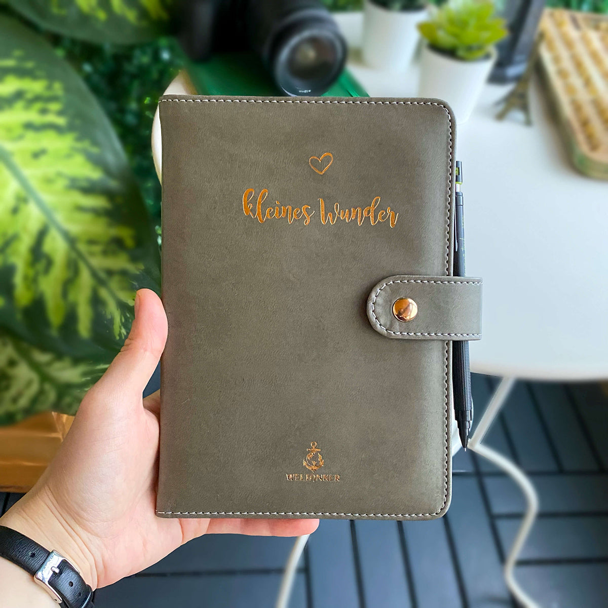 Tesino Vegan Leather Motherpass, a stylish motherhood organizer with multiple compartments, designed for new moms.