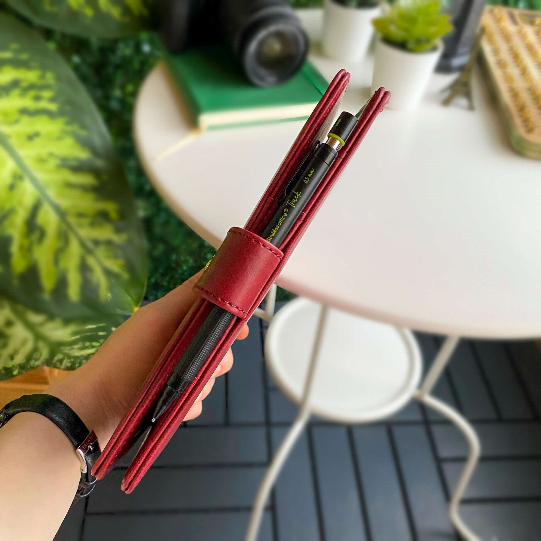 Tesino Vegan Leather Motherpass, a stylish motherhood organizer with multiple compartments, designed for new moms.