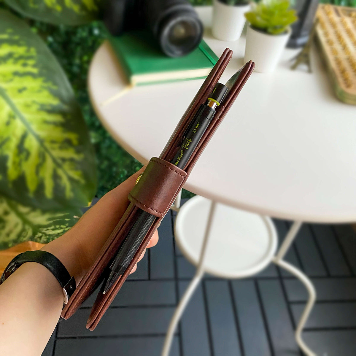 Tesino Vegan Leather Motherpass, a stylish motherhood organizer with multiple compartments, designed for new moms.