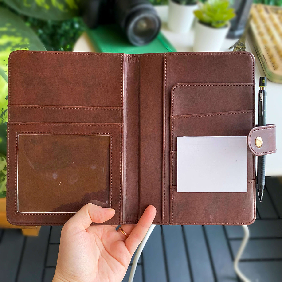 Tesino Vegan Leather Motherpass, a stylish motherhood organizer with multiple compartments, designed for new moms.