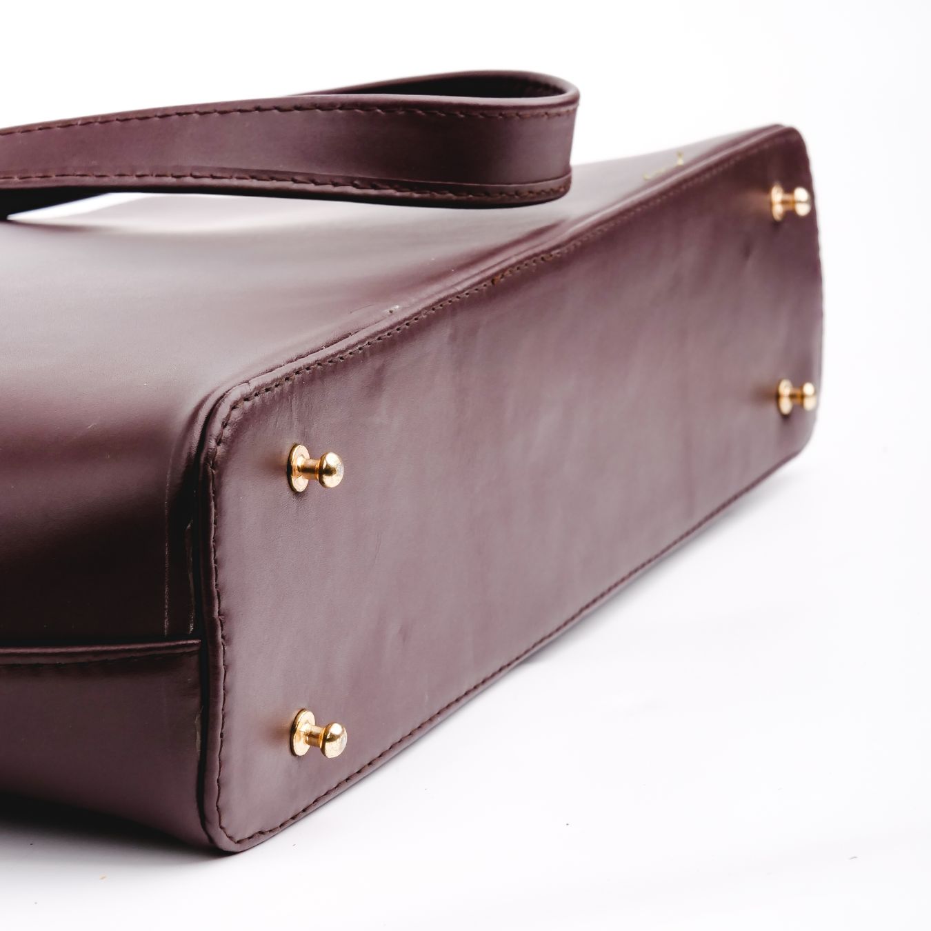 Boss Lady Pure Leather Women's Tote Bag in Wine Berry, showcasing its elegant design and spacious interior.