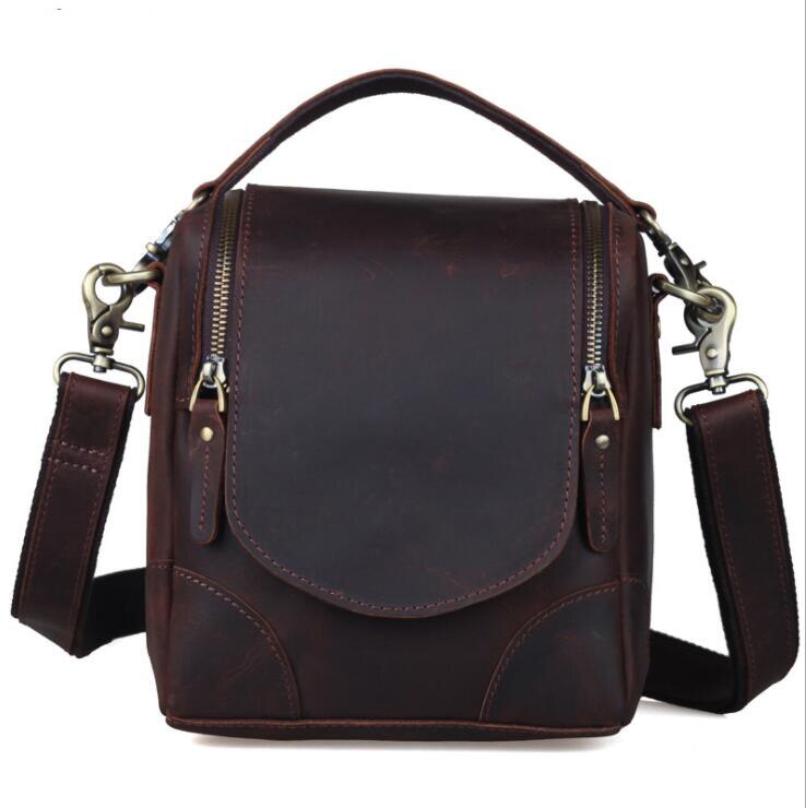 The Calista small leather camera bag made from full-grain leather, featuring a zippered back pocket and adjustable shoulder strap.