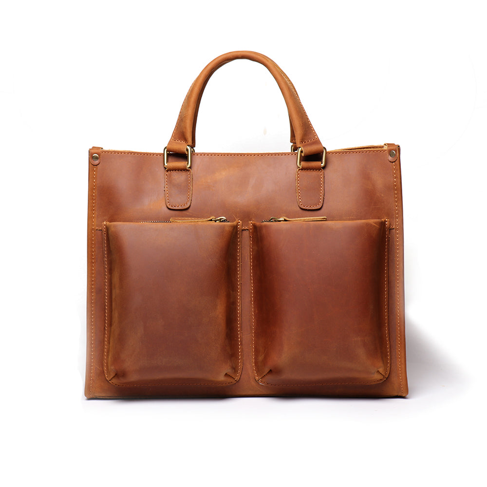 The Dagmar Leather Briefcase showcasing its vintage design, made of high-quality crazy horse leather, featuring multiple compartments and adjustable straps.
