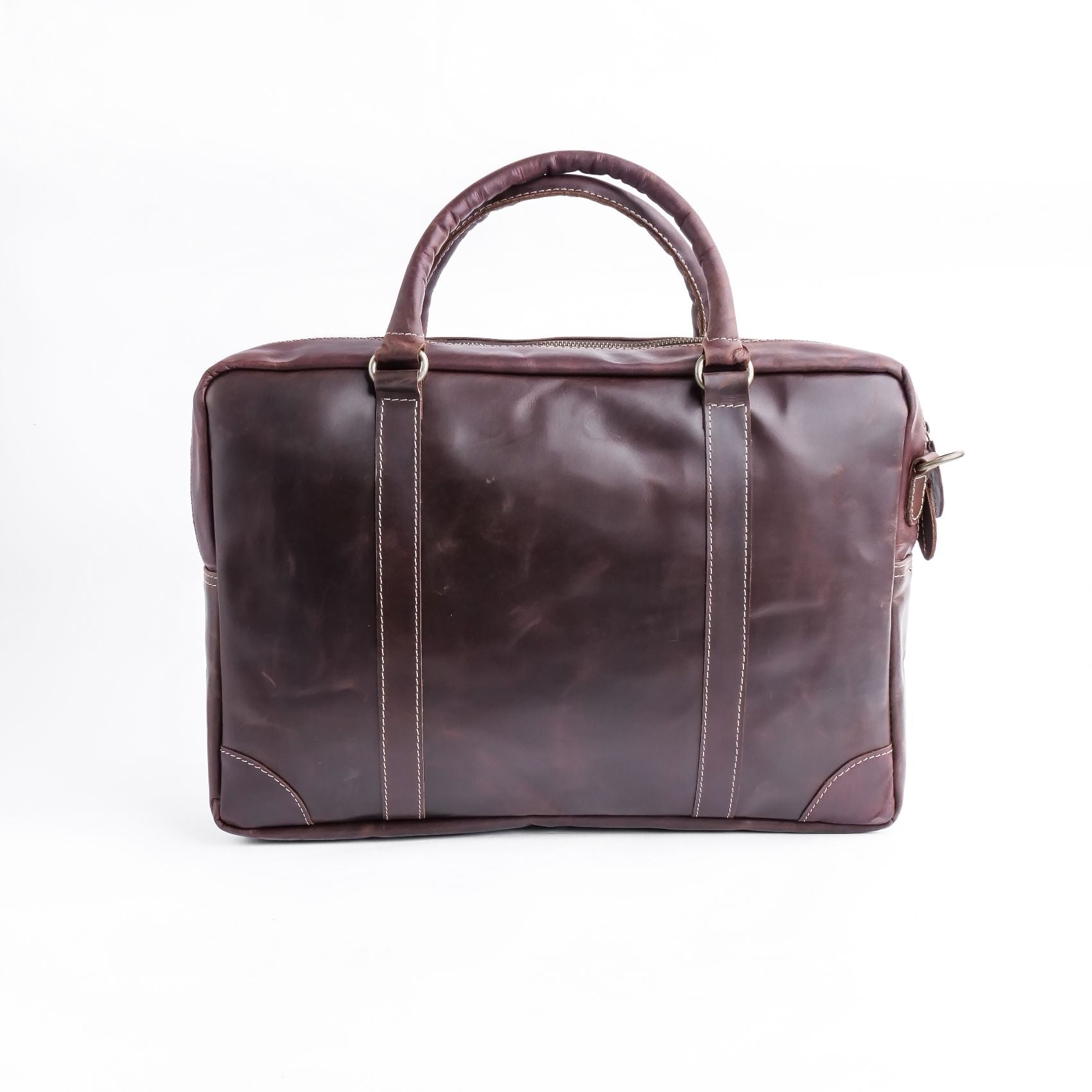 The Maverick Vintage Leather Laptop Bag in dark brown, showcasing its padded laptop pocket, adjustable shoulder strap, and multiple internal pockets.