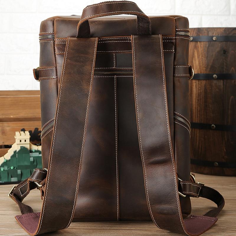 The Raoul Backpack, a handmade vintage leather backpack featuring multiple pockets and adjustable straps, showcasing its rustic charm and durability.