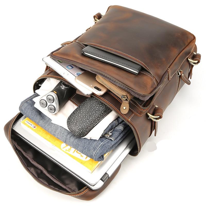 The Raoul Backpack, a handmade vintage leather backpack featuring multiple pockets and adjustable straps, showcasing its rustic charm and durability.