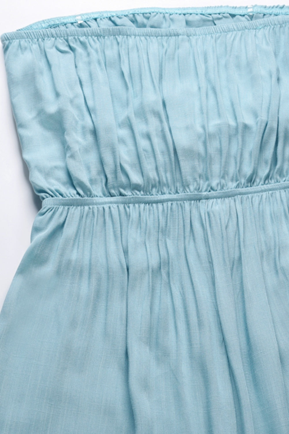 A stylish Tied Cutout Tube Wide Leg Jumpsuit featuring a tied design and wide leg cut, perfect for various occasions.