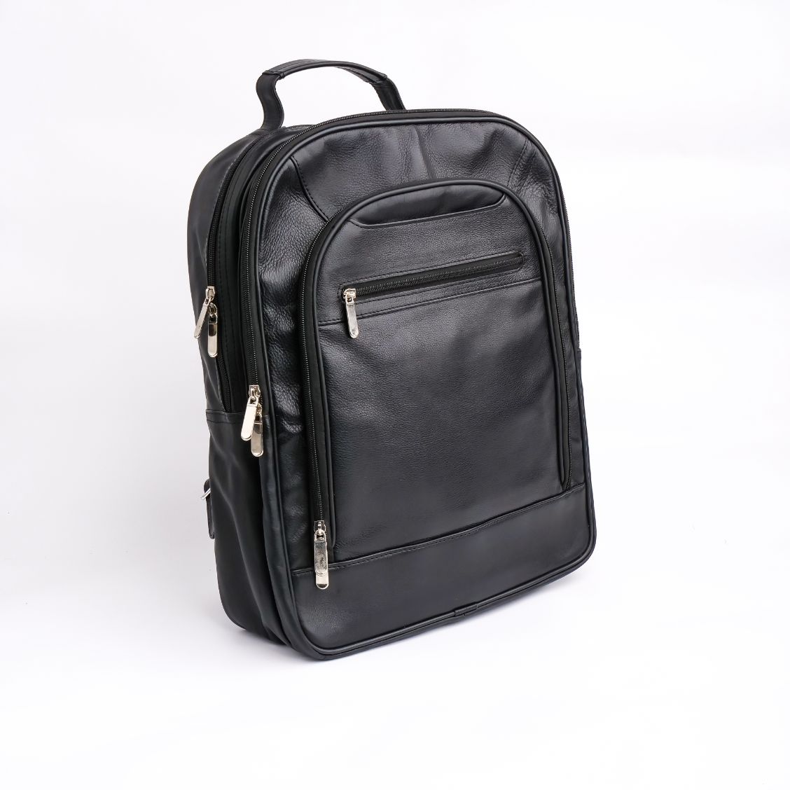 Trio Leather Backpack in black, showcasing premium cowhide leather, three zip compartments, and padded shoulder straps.