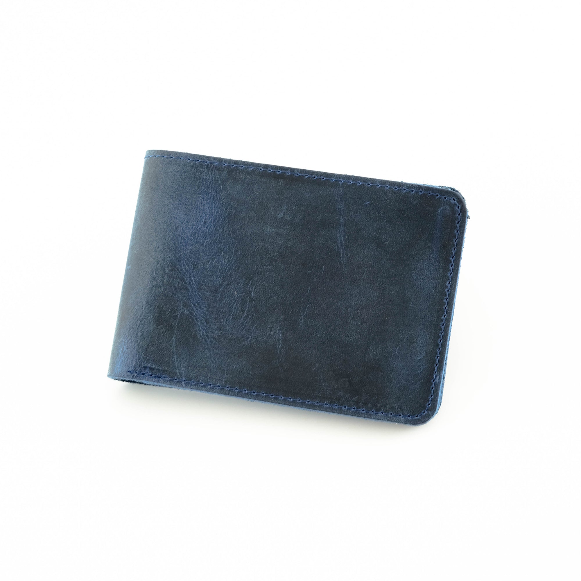 Tulipa Genuine Leather Natural Wallet in four colors: Brown, Red, Blue, and Green, showcasing its sleek design and card slots.
