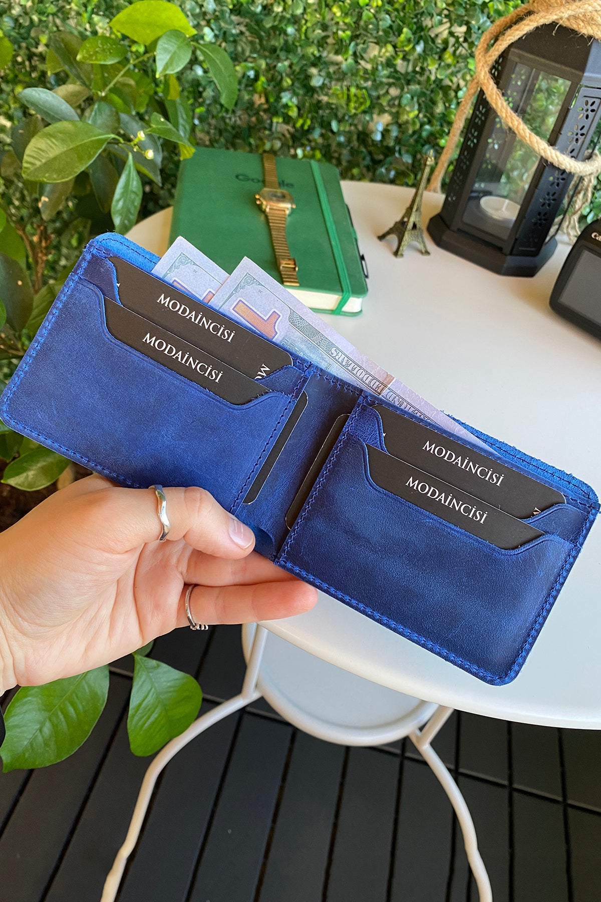 Tulipa Genuine Leather Natural Wallet in four colors: Brown, Red, Blue, and Green, showcasing its sleek design and card slots.